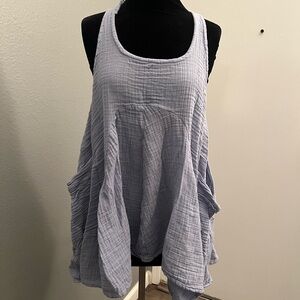Free People Oversized Peasant Tank in a light blue/lavender color